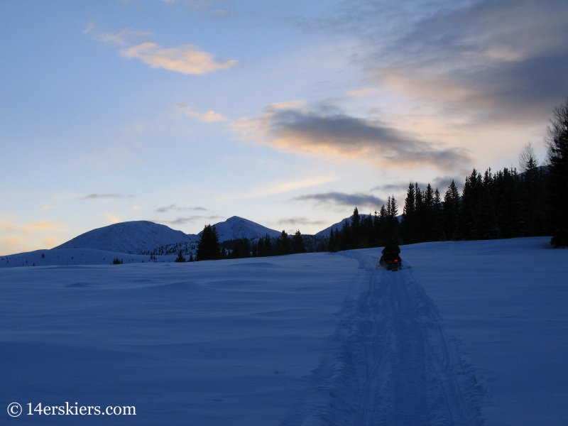 Using snomobiles to access Culebra Peak.