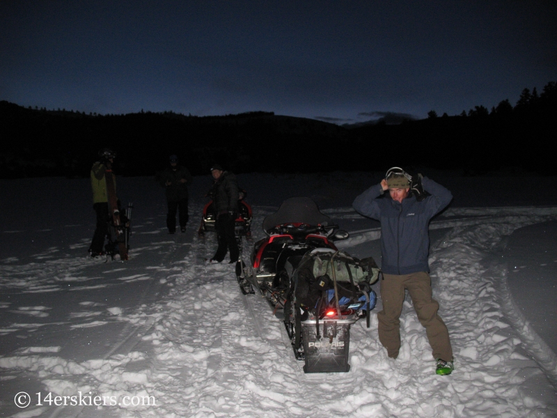 Using snowmobiles to access Culebra Peak.