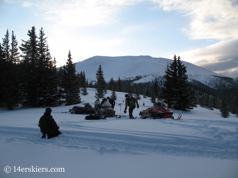 Using snowmobiles to access Culebra Peak.