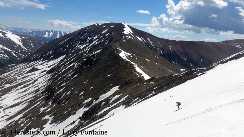 skiing in front of mt lincoln