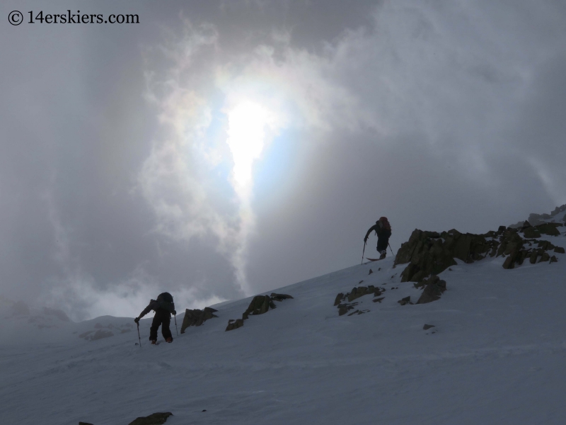 Approaching Fakie Saddle while backountry skiing near Green Wilson Hut.