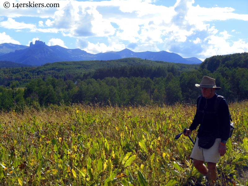 My dad hiking with the Castles in the background, on Swampy Pass trail near Crested Butte.