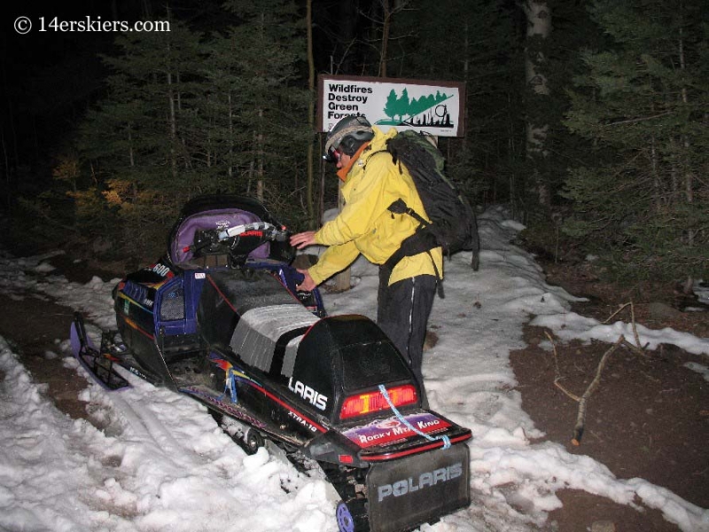 Starting snowmobile in morning. 