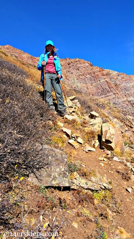 Hiking steep grass.