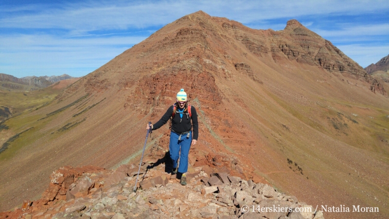 Hiking on ridge east of West Maroon Pass. 